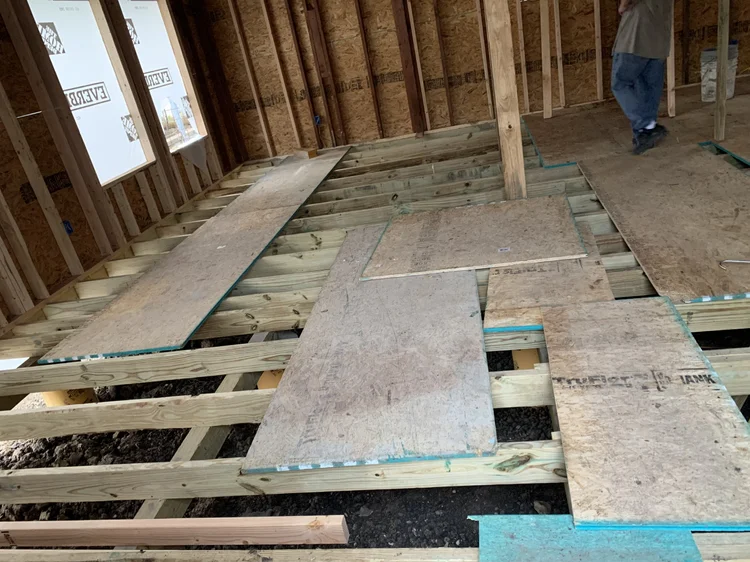 Subfloor being replaced during a floor repair